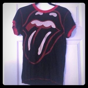 Rolling Stones concert shirt.